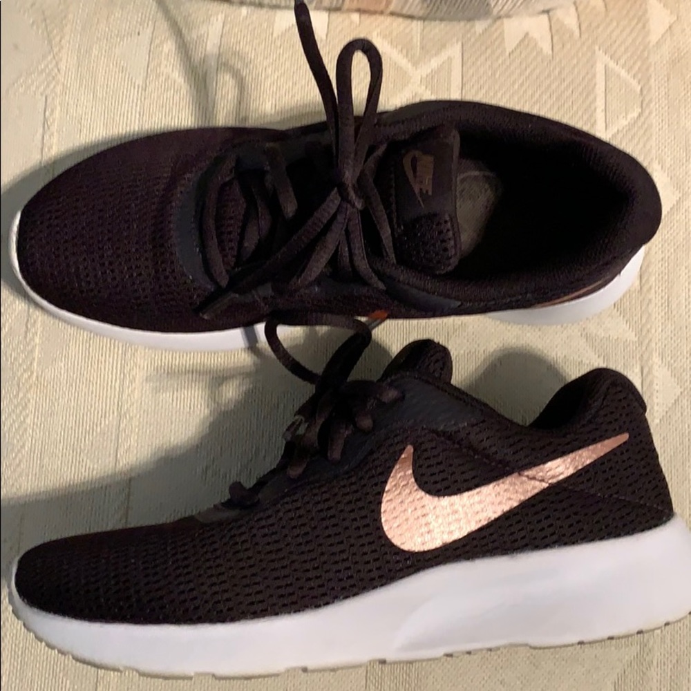 Nike with rose gold, worn only twice!